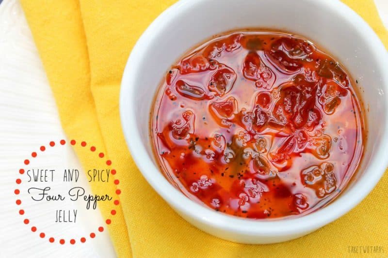 Spicy Four Pepper Jelly Sauce is a versatile condiment! You can use it with cream cheese as a dip, a coating for your crispy chicken wings, or smeared on your morning bagel for a hint of spice! Sweet and Spicy Four Pepper Jelly Sauce Recipe | Take Two Tapas