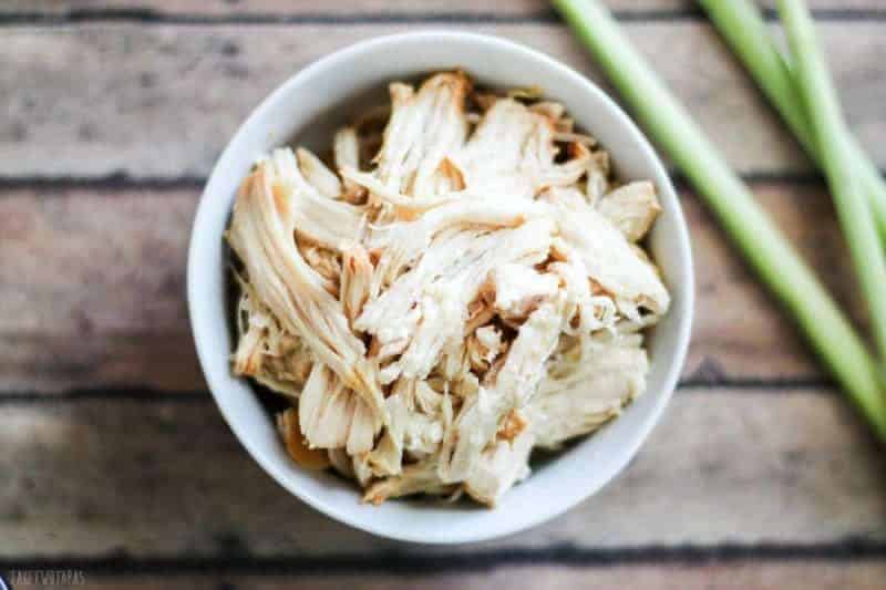 Prepare slow cooker lemongrass chicken with minimal effort and have lots of shredded meat on hand for your next recipe. This chicken has a hint of garlic and the subtle flavor of citrus thanks to the lemongrass! Slow Cooker Lemongrass Chicken Recipe | Take Two Tapas