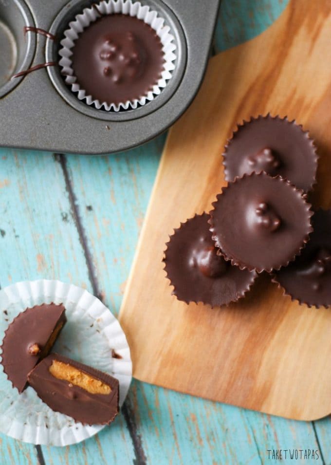 Skip the store-bought candy and make your own Dark Chocolate Peanut Butter cups. These have a nice crunch in the filling with toasted hemp seeds! Dark Chocolate Peanut Butter Cups Recipe | Take Two Tapas