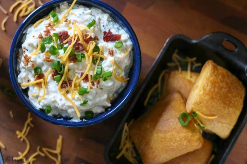 These flaky crescent bombs are filled with the creamy and irresistible crack dip making them double trouble! Perfect for your next get together! Crack Dip Crescent Bombs Recipe | Take Two Tapas