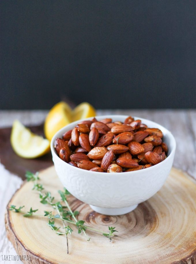 Need a healthy snack? Toasted almonds are perfect! They are nutty and buttery. The bright flavor lemon cuts through the richness and the fresh thyme add some floral notes. These Lemon Thyme toasted almonds are a great snack to keep you full between mealtimes! Lemon Thyme Almonds Recipe | Take Two Tapas | #almonds #Paleo #Lemon #thyme #Snacks #Nuts #Healthy #Whole30
