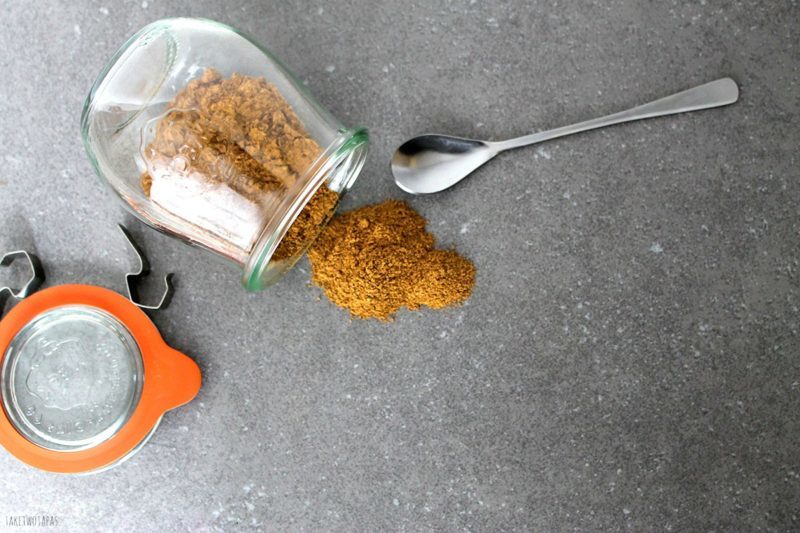 overhead picture of chai spice pouring out of jar