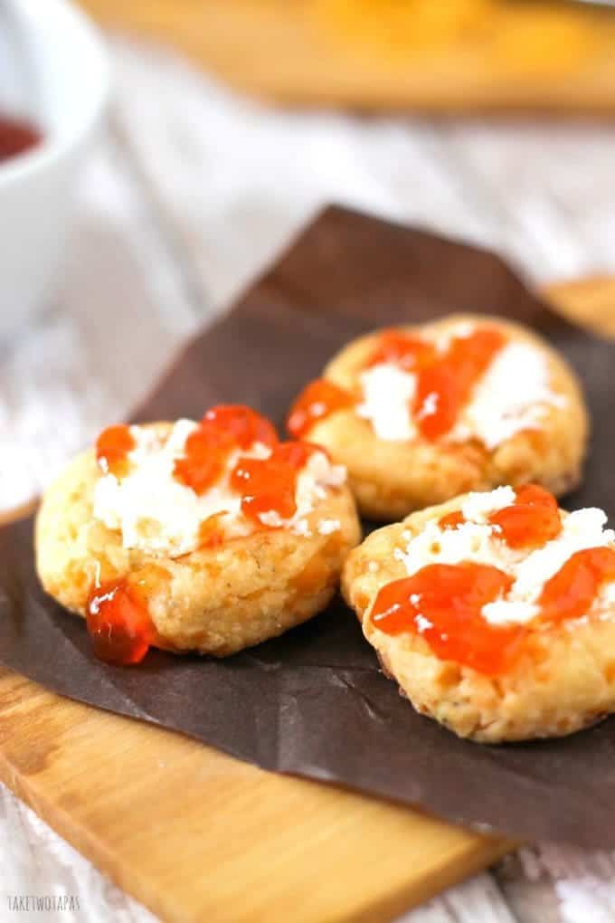 Who knew that cookies could be savory? Spicy Cheese Thumbprints with Goat Cheese and Hot Pepper Jelly Recipe | Take Two Tapas | #Cookies #Thumbprints #Spicy #CheeseCrackers #HotPepperJelly #GoatCheese