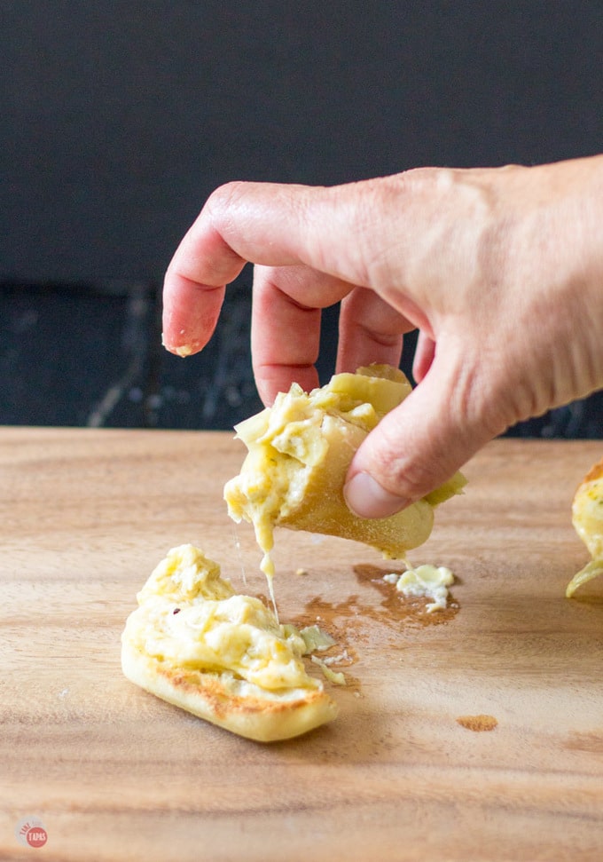 Garlic Artichoke Cheese Toasts are an easy recipe for a quick appetizer | Take Two Tapas | #GarlicBread #Artichokes #Garlic #Toasts #CheeseToastRecipe #Appetizer