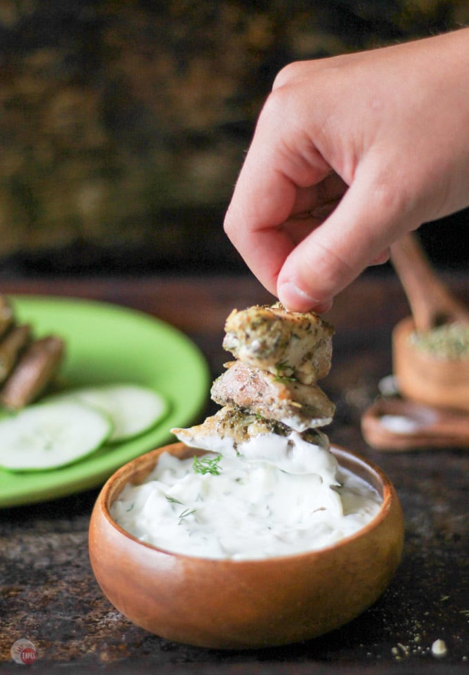 Greek Chicken Nuggets made with homemade Greek Seasoning Mix make easy party food. Serve with homemade Tzatziki Sauce. Greek Chicken NUggets Recipe | Take Two Tapas | #GreekFood #GreekSeasoning #Chicken #ChickenNuggets #Skewers #EasyPartyFoods