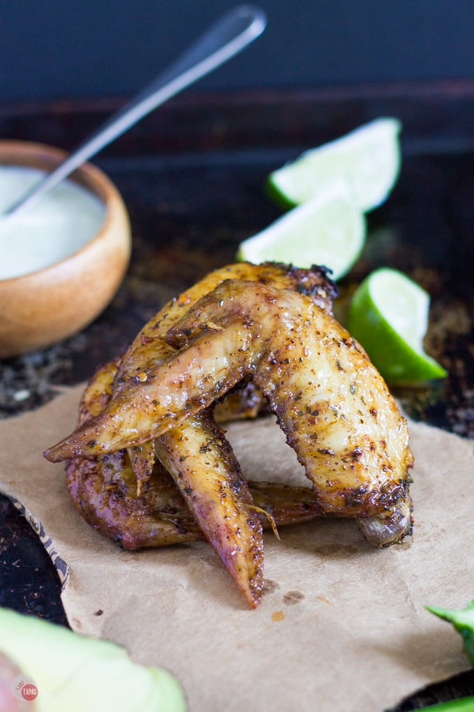 Serve these Southwest Chicken Wings with an Avocado Salsa Verde sauce to cool them down! | Take Two Tapas | #Southwest #TacoSeasoning #ChickenWings #SouthwestChickenWings #ChickenWingRecipe #ChickenWingFlavors