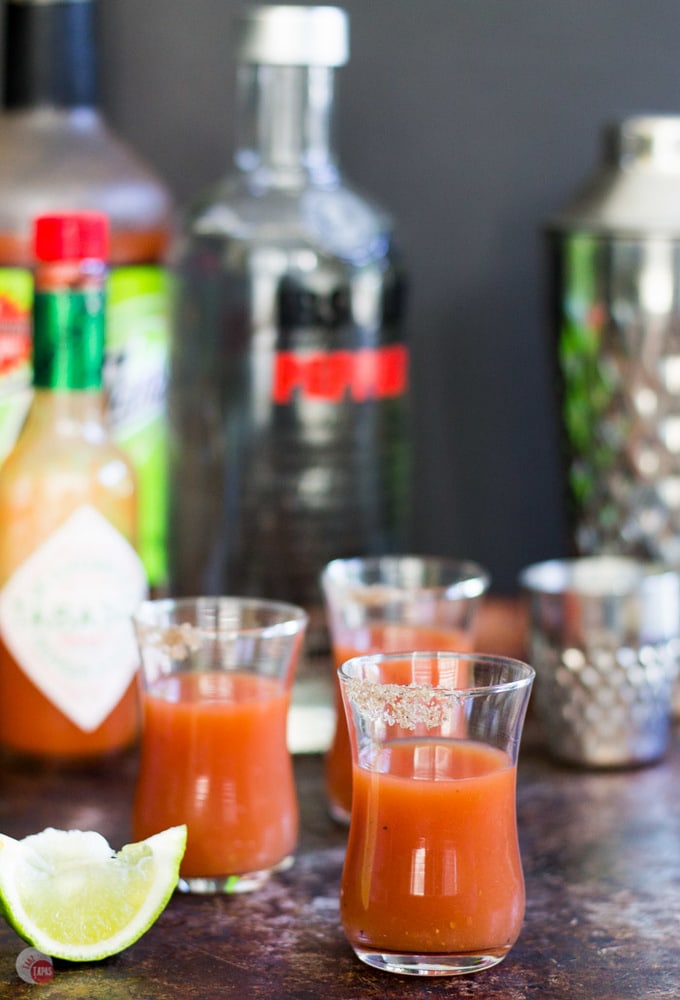 Bloody Mary shots are a great way to enjoy your favorite Brunch cocktail but in a smaller version! Rimmed with Applewood smoked salt add a great layer of flavor to the shot! Bloody Mary Shots Recipe | Take Two Tapas #BloodyMary #Shots #Cocktails