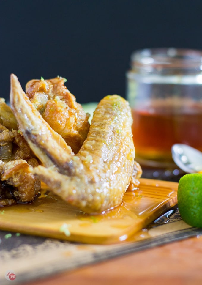 Grab a few napkins to eat with these Garlic Lime Chicken Wings with Honey | Take Two Tapas | #Garlic #Lime #ChickenWings #Sweet #Spicy #Honey #ChickenWingSauce