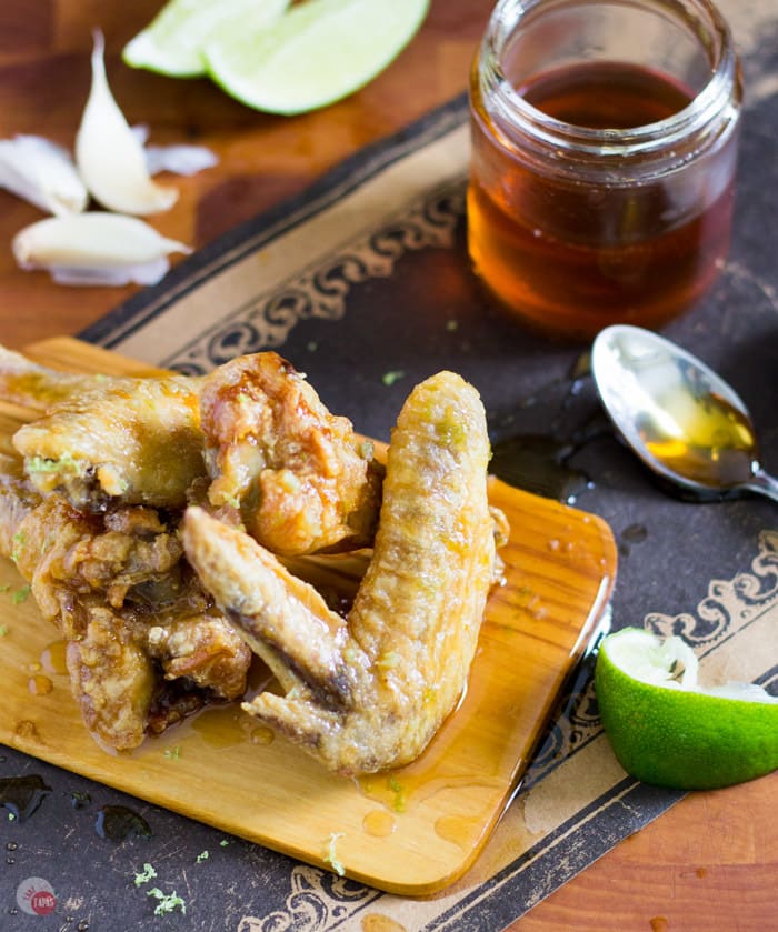 Chicken wings are always better with lots of garlic, a dash of lime and dripping with the sticky sweetness of honey! Grab some wings and a ton of napkins unless you want to lick your fingers clean. Garlic Lime Chicken Wings with Honey Recipe | Take Two Tapas
