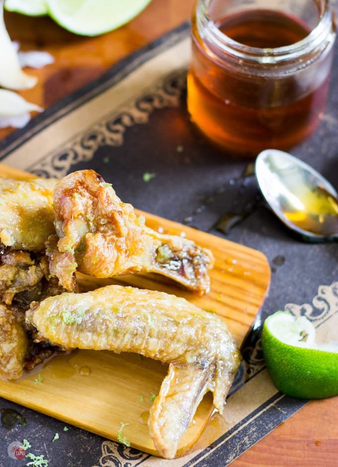 Grab some wings and a ton of napkins unless you want to lick your fingers clean. Garlic Lime Chicken Wings with Honey Recipe | Take Two Tapas | #Garlic #Lime #ChickenWings #Sweet #Spicy #Honey #ChickenWingSauce