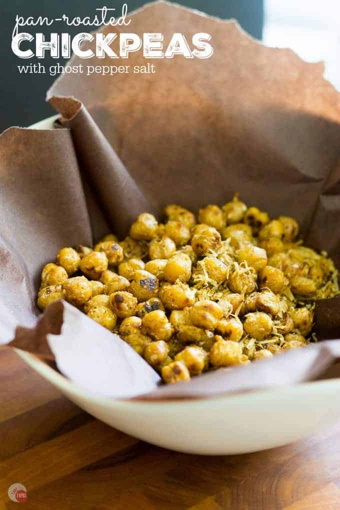 Crispy Pan Roasted Chickpeas are a healthy and protein filled snack, tossed with cheese and spicy ghost pepper, that is so addicting you might as well make two batches at once! Pan Roasted Spicy Chickpeas Recipe with Ghost Pepper Salt | Take Two Tapas | #GhostPepper #Chickpeas #Roasted #Fried #HealthySnacks #Snacks #Spicy