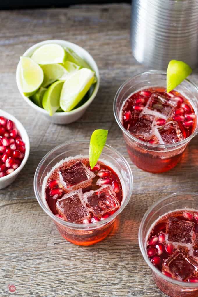Make a large batch of Pomegranate Ginger Ale Sparkler Punch will help you celebrate your holiday party with ease! Pomegranate Sparkler Cocktail Recipe | Take Two Tapas | #PomegranatePunch #PomegranateSparkler #LargeBatchPunch #HolidayPunch #HolidayEntertainingTips #GingerAlePunchRecipe #PunchRecipe