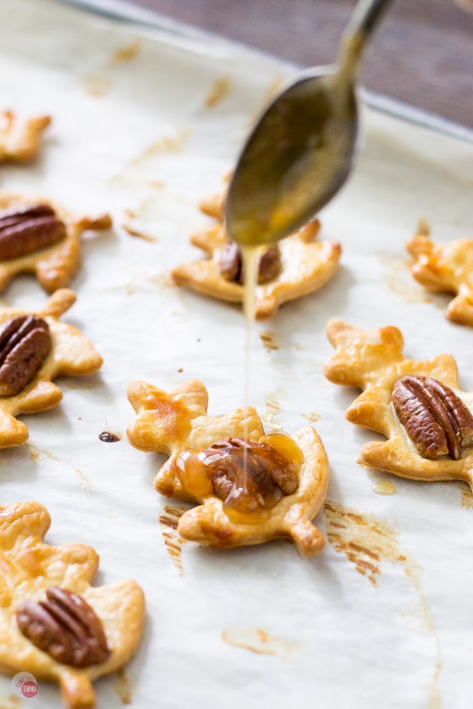 Cut these Pie Crust Cookies into your favorite shape to fit any holiday or occasion. Whiskey Caramel Pie Crust Cookies Recipe | Take Two Tapas | #Whiskey #Caramel #PieCrust #Cookies #PieCrustCookies #WhiskeyCaramel #CookieRecipe