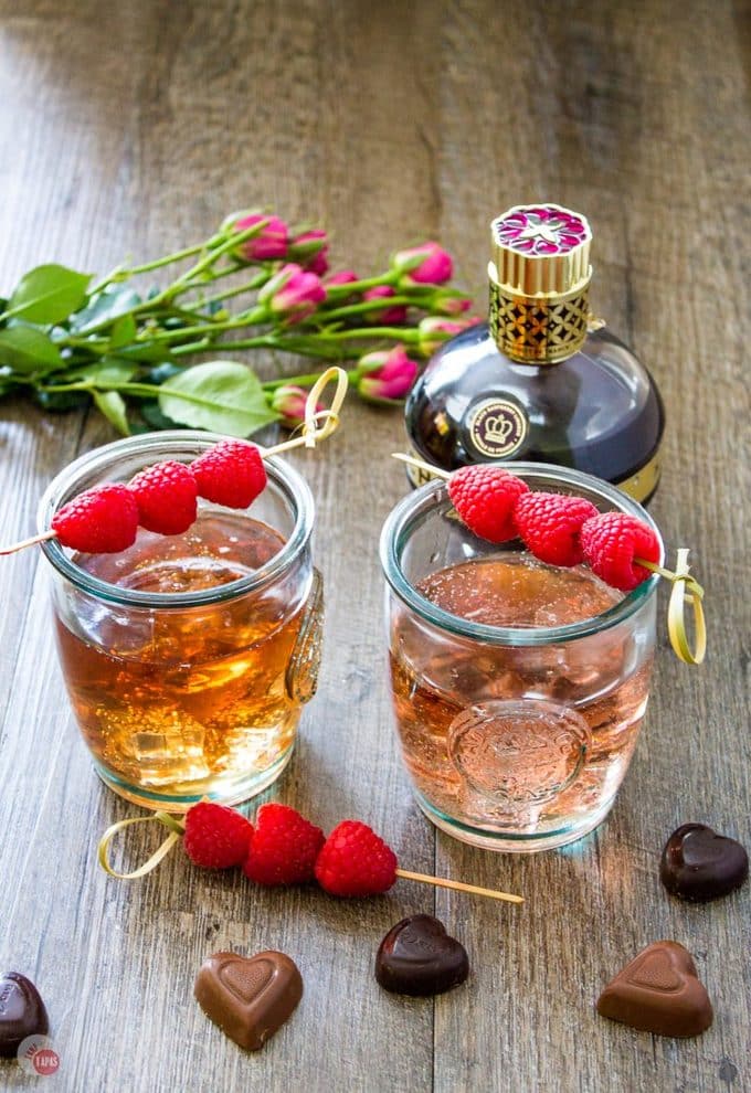 Chambord Raspberry liqueur mixed with bourbon and lemon-lime soda is the perfect way to celebrate with your date! Couples that drink together, stay together. Raspberry Love Cocktail | Take Two Tapas