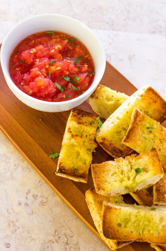 Overhead of Pan con Tomate on a cutting board