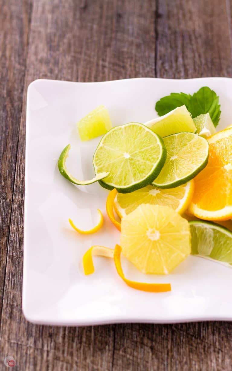 slices of Oranges, Lemons, Limes on a plate