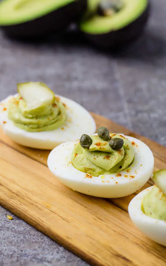 https://www.taketwotapas.com/wp-content/uploads/2018/02/Avocado-Deviled-Eggs-6.jpg.webp