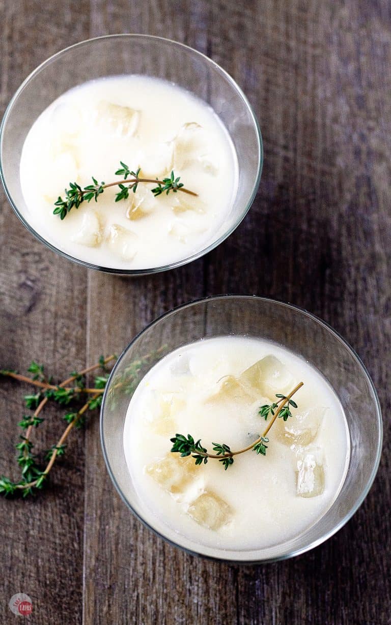 overhead shot of 2 lemon thyme amaretto cocktails