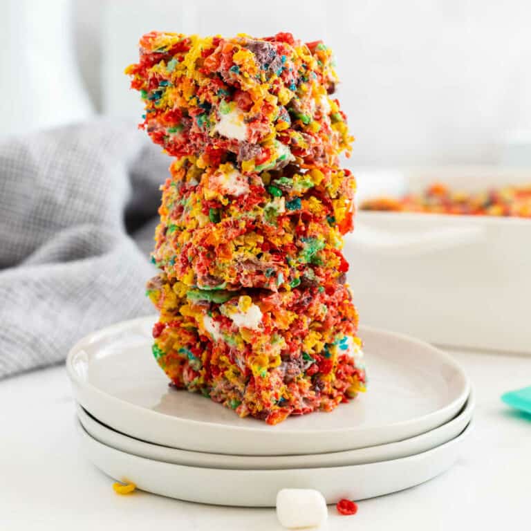 stack of rice krispie treats on a white plate