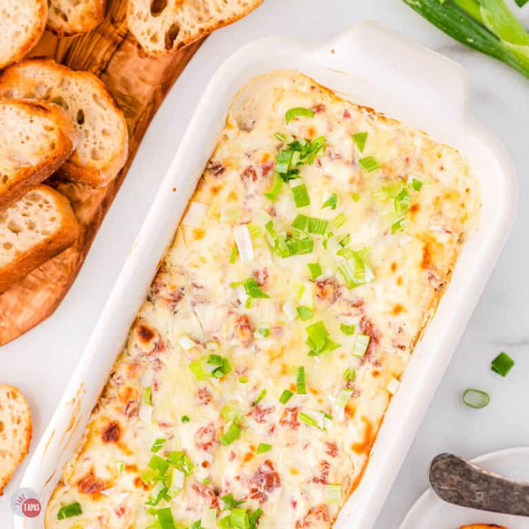 baking dish of boudin dip with crostini