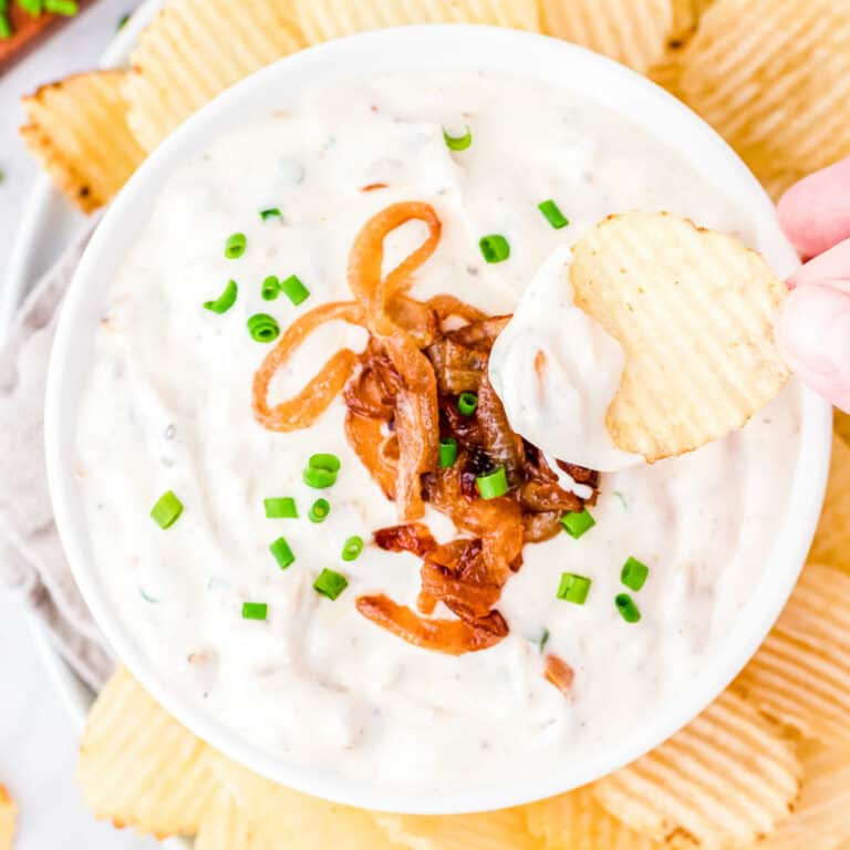 bowl of French Onion Dip with a potato chip