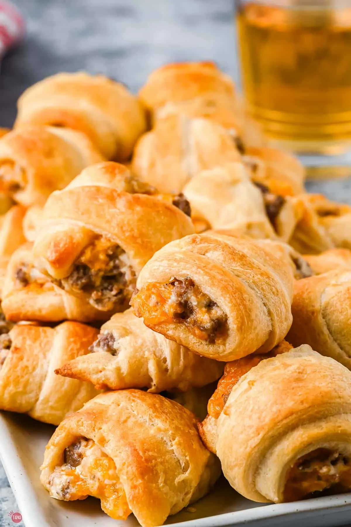 https://www.taketwotapas.com/wp-content/uploads/2022/10/Sausage-Cream-Cheese-Crescents-Take-Two-Tapas-17.jpg.webp