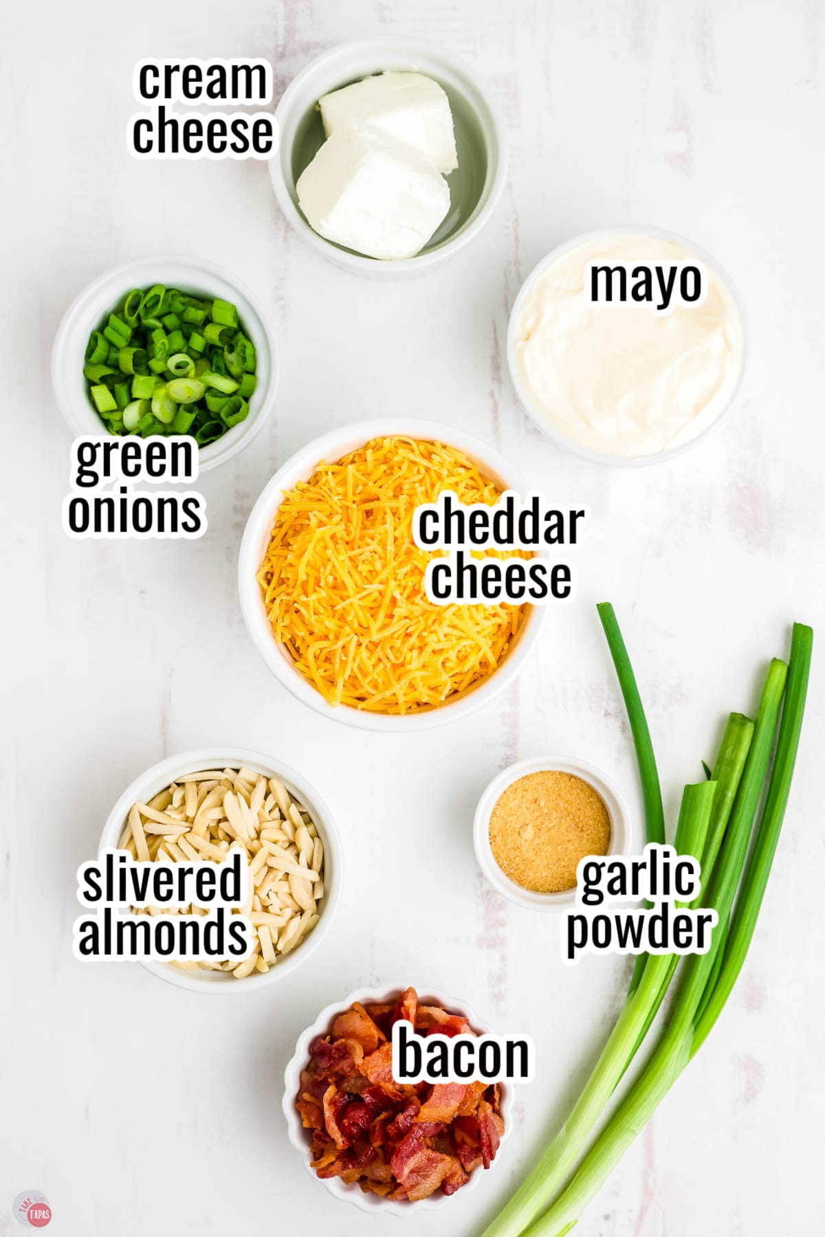 ingredients for a dip recipe in individual bowls