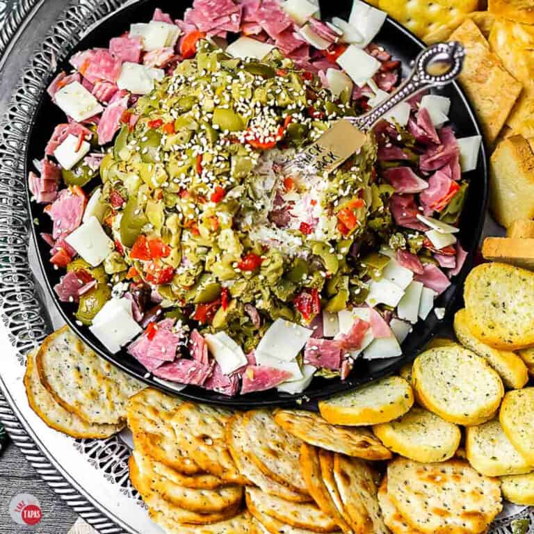 muffuletta cheese ball with crackers