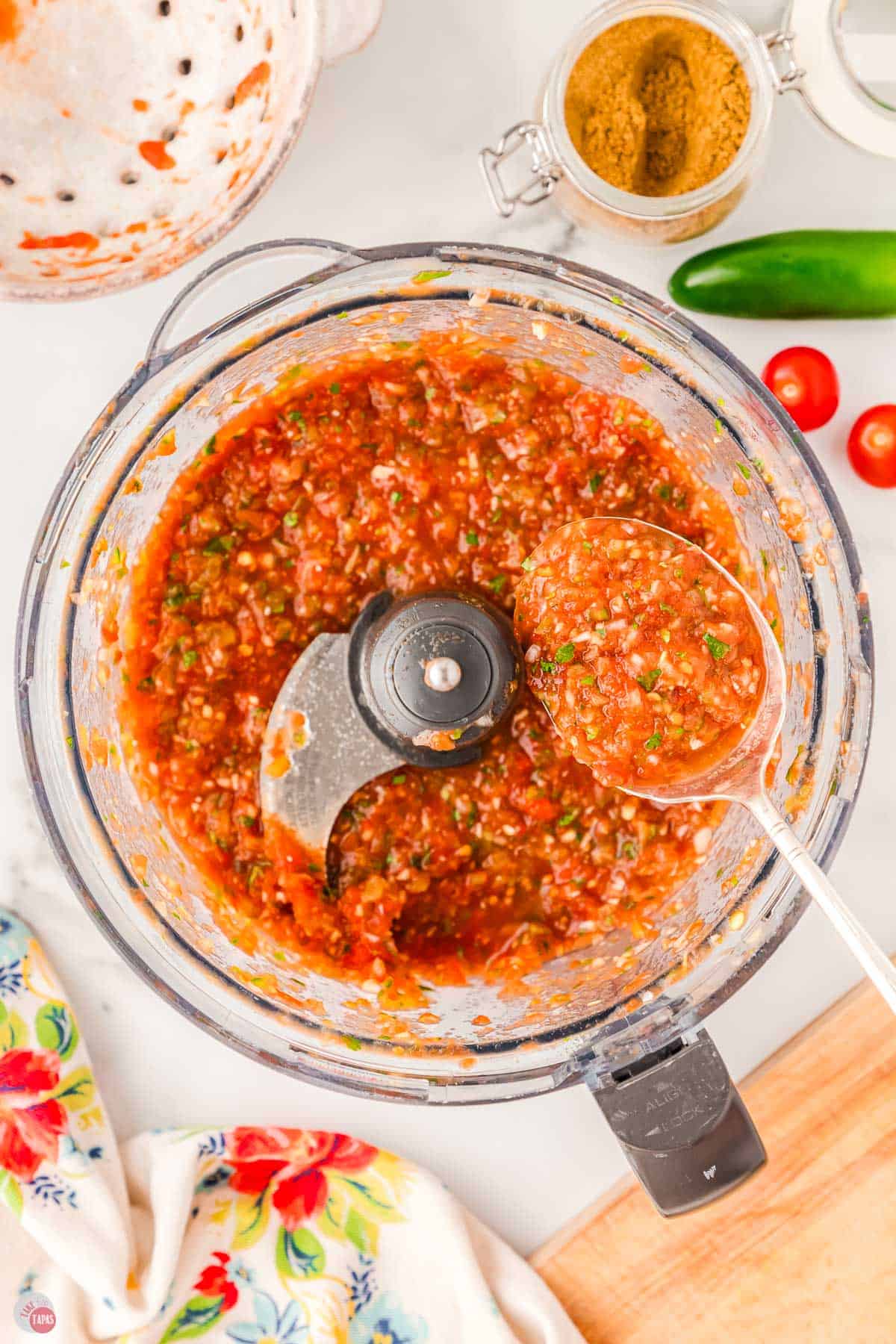 spoon scooping out restaurant style salsa