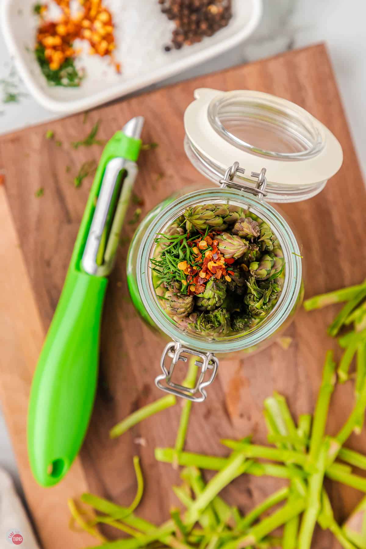 place asparagus spears in a jar