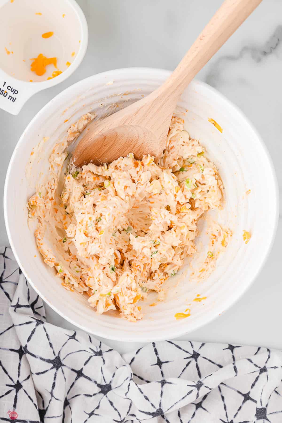 cheese ball mixture in a white bowl