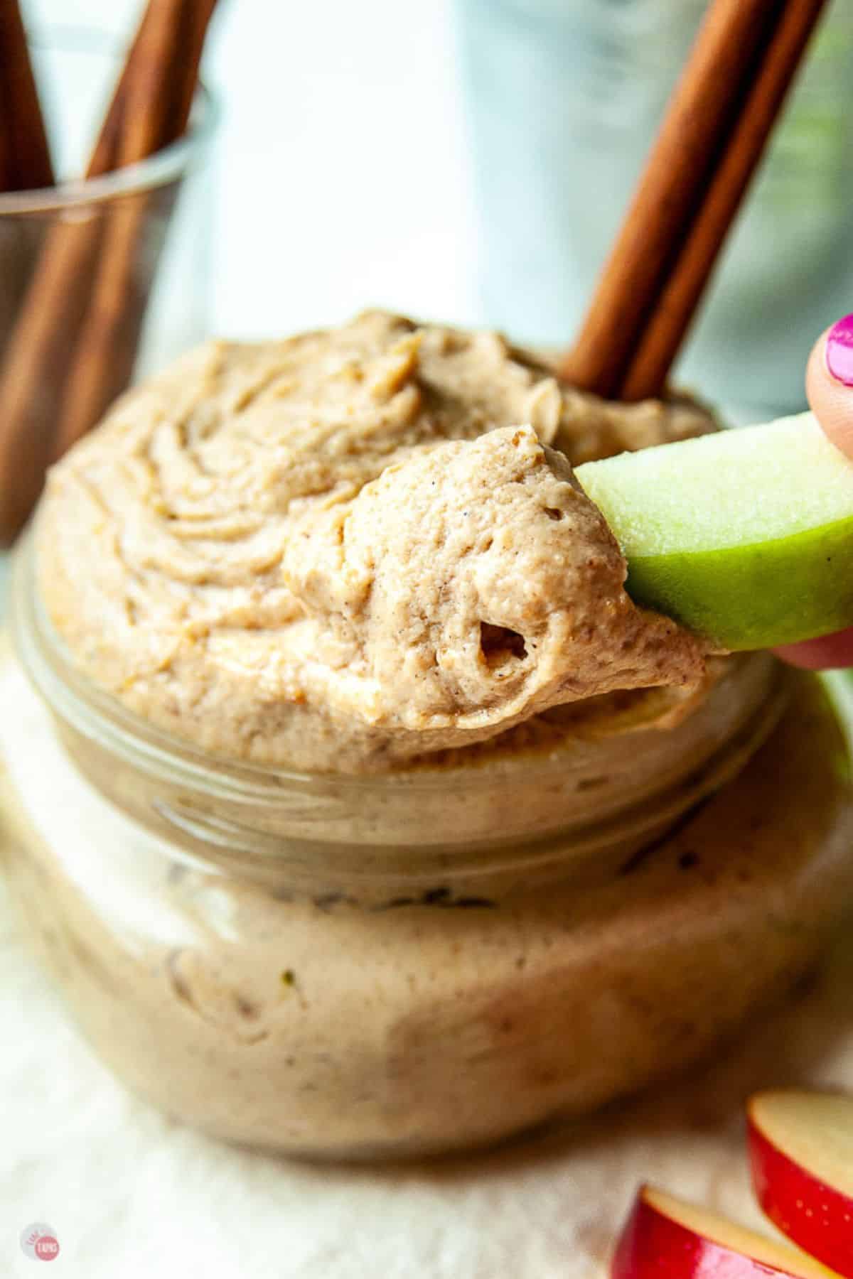 crunchy apple slices in a dessert dip