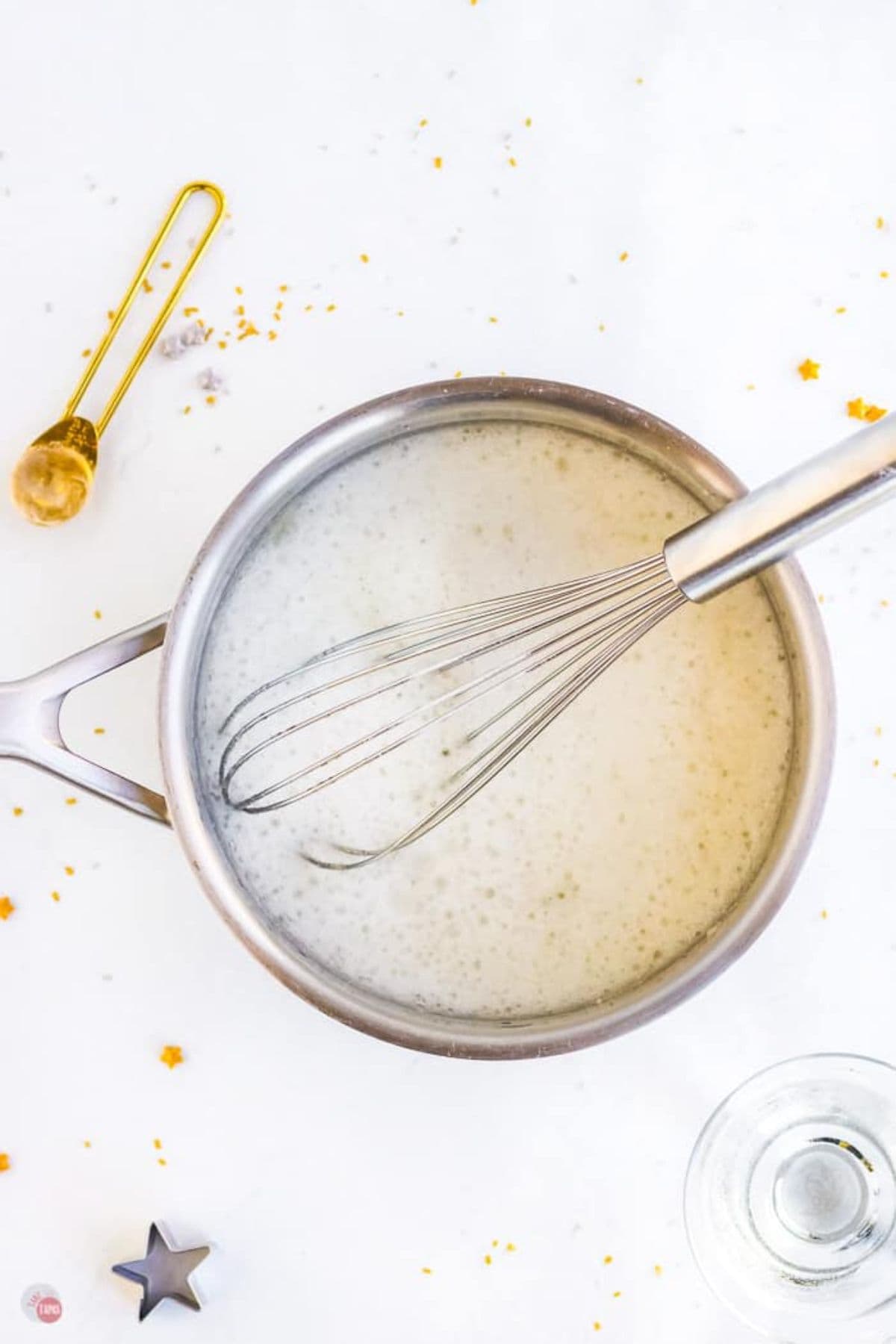 gelatin powder and lemonade in a saucepan with a whisk