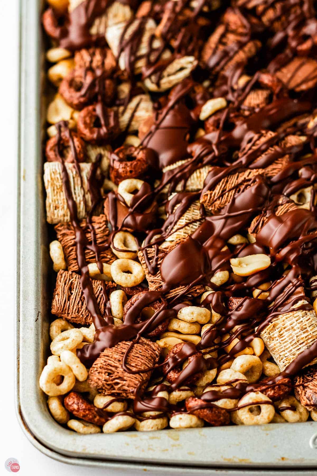 baking sheet with buckeye snack mix on it