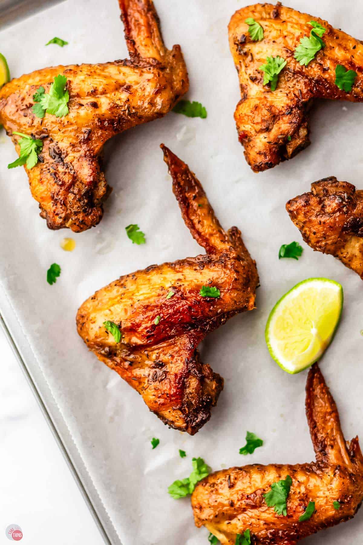 baking sheet with chicken wings on it