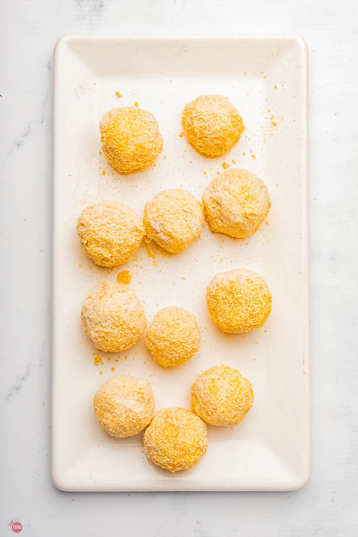 plate of croquettes rolled in breadcrumbs